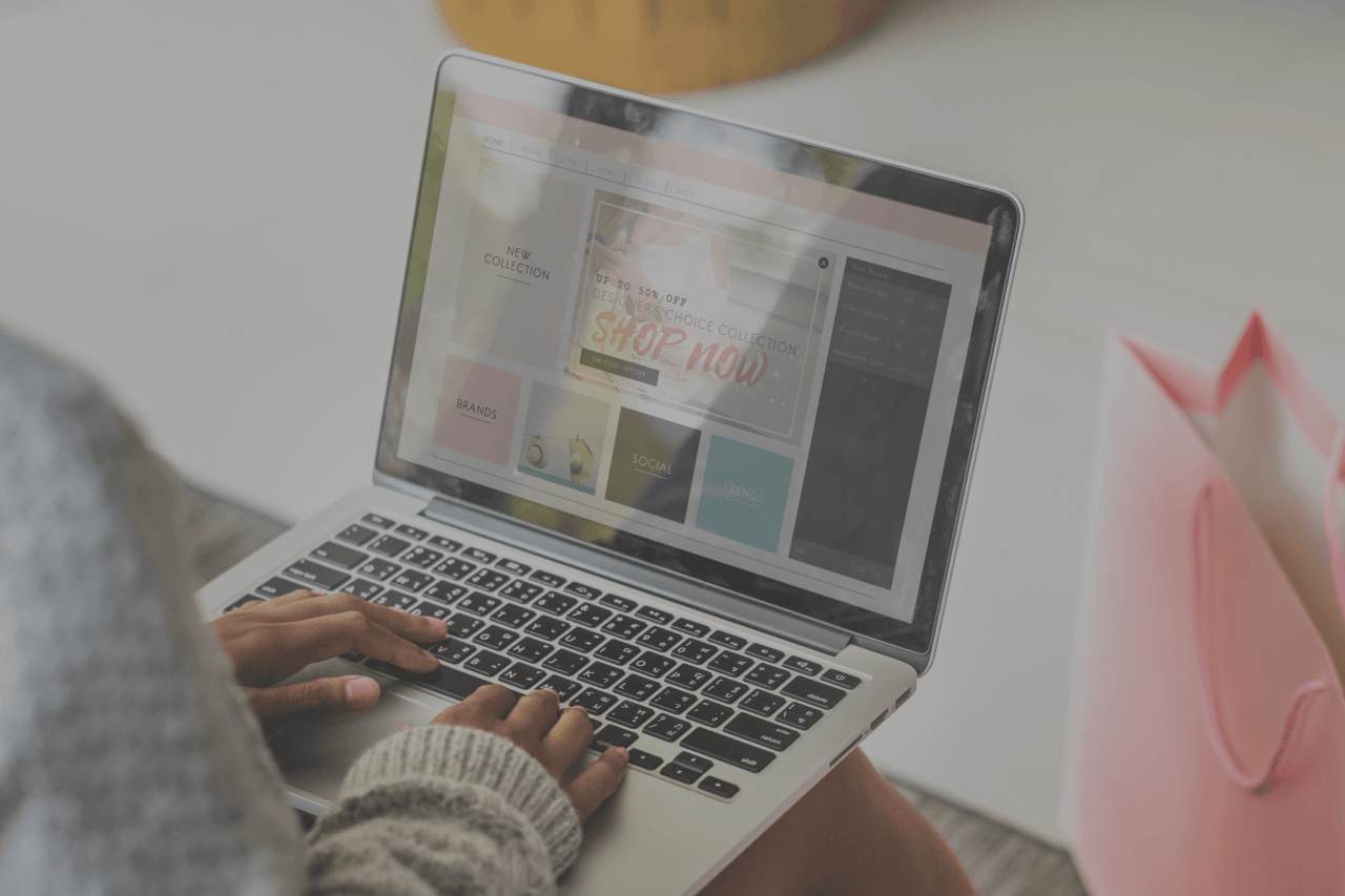 woman on computer looking at remarketing advertising